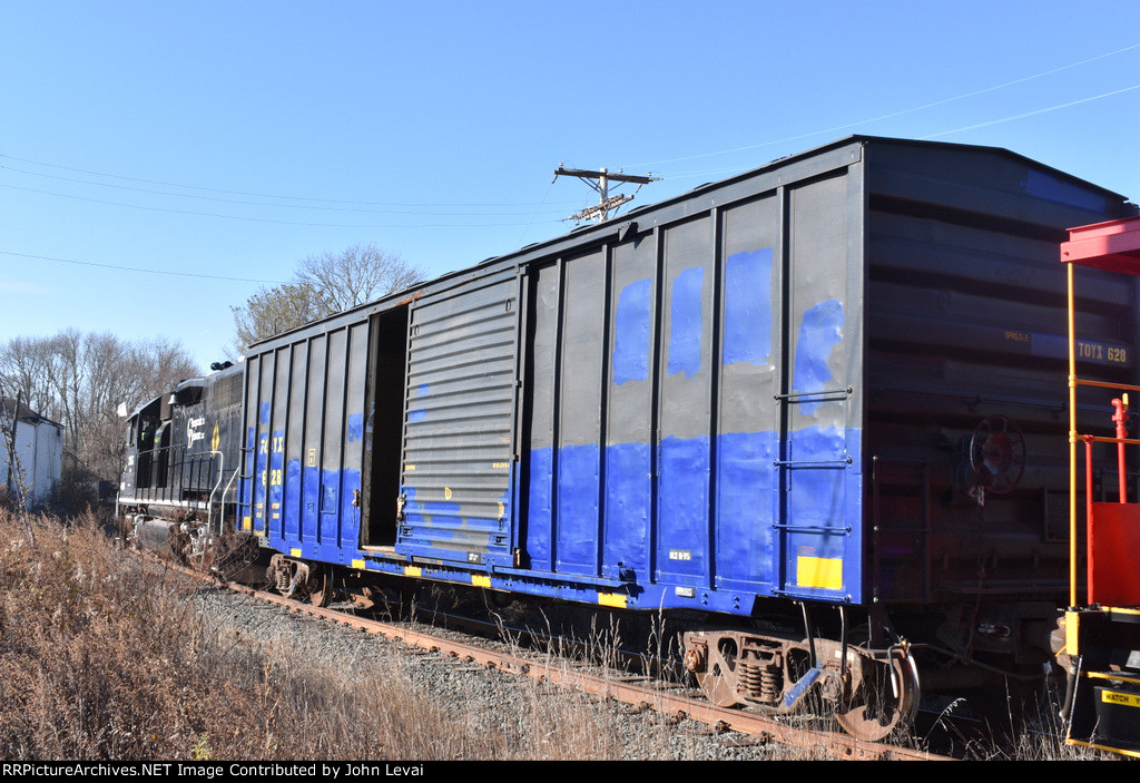 Boxcar on the TFT train as it moves toward Freehold and Jamesburg